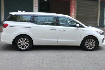 kia carnival limousine luxury car hire delhi